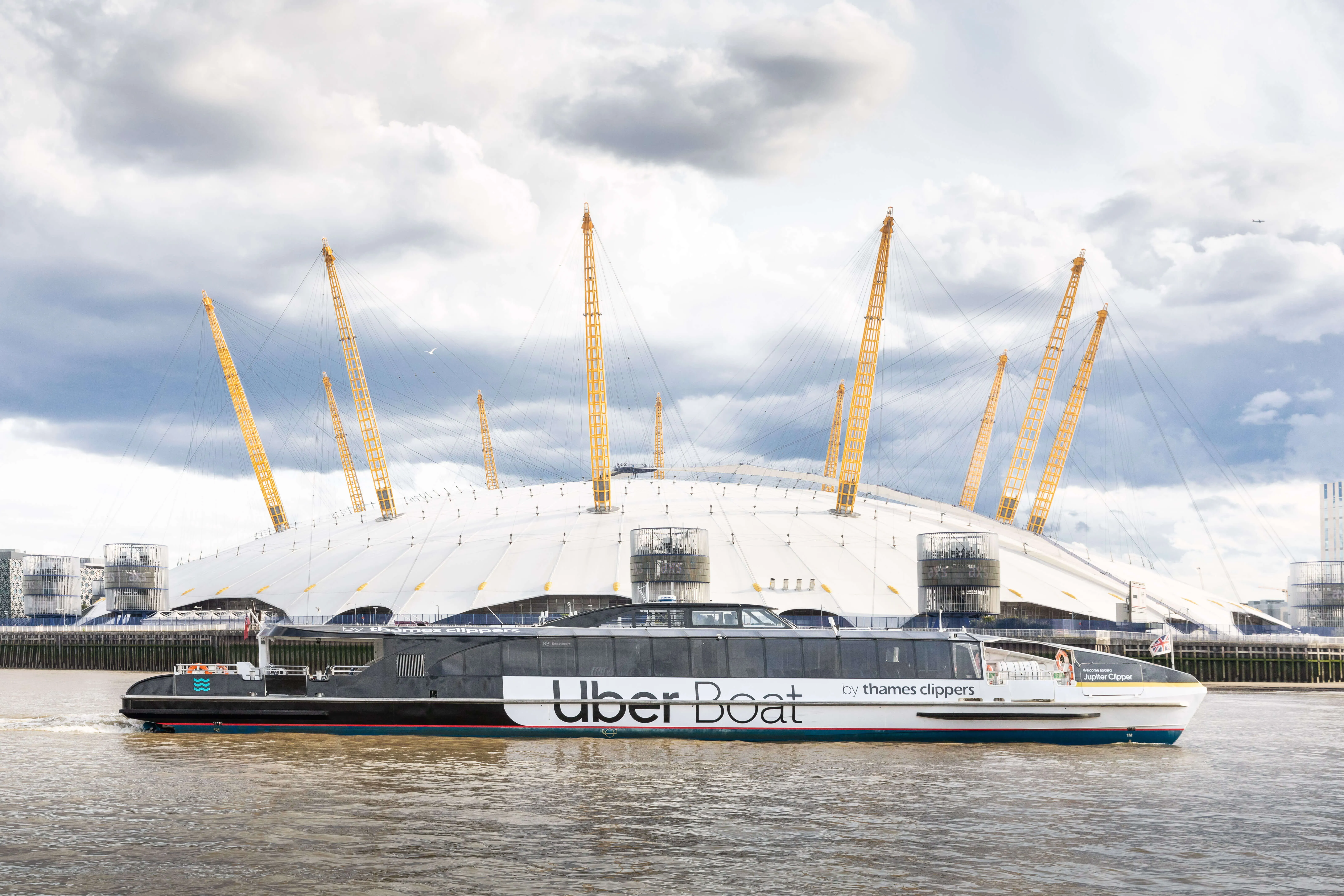 Uber Boat arriving at Barking Riverside Pier at dusk